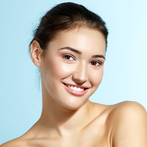 woman smiling with hair up